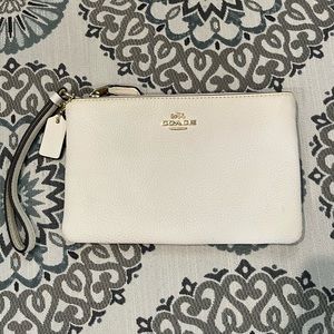 Coach cream leather wristlet